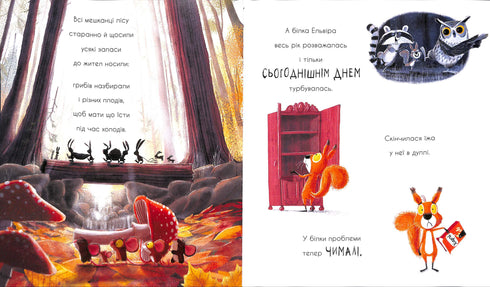 Due scoiattoli e un cono da un ramo